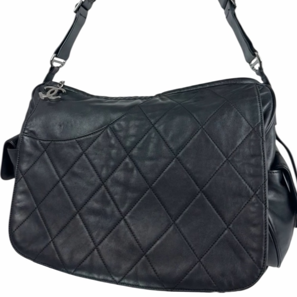 CHANEL Black Quilted Leather Shoulder Bag with Silver CC Charm
